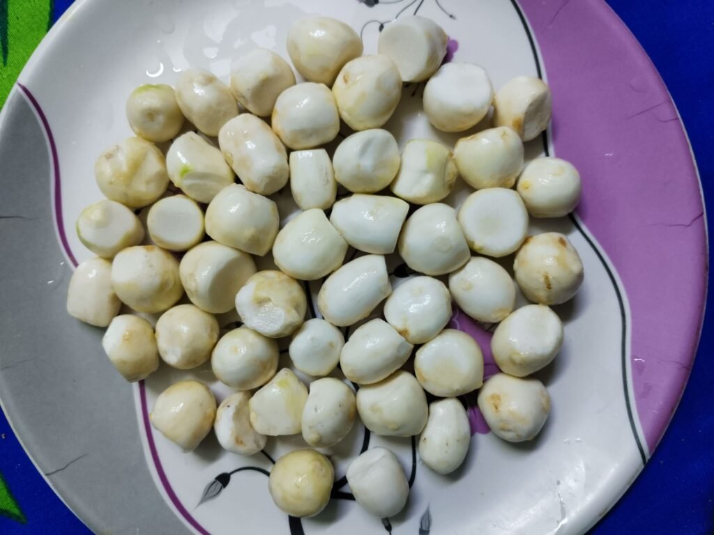 peeled and cut taro pieces on a plate ready to be added to the beef stew